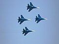 4 Sukhoi Su-27Ps of the Russian Knights performing at Aero India 2013