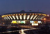 The Spodek multipurpose sports arena at night