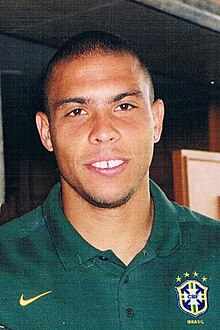 Portrait view of Ronaldo wearing a polo shirt, taken indoors