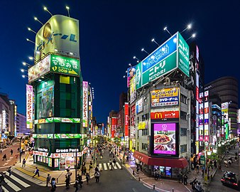 Buildings with colorful neon street signs at blue hour, Shinjuku, Tokyo