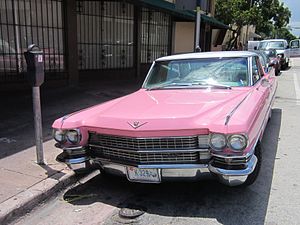 Pink is sometimes associated with extravagance and a wish to be noticed. A 1963 pink Cadillac.