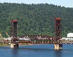 Preserved Southern Pacific 4449 pulls an excursion train across BNSF Railway Bridge 5.1 in 2011