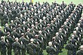 Finnish conscripts and women serving voluntary military service swearing the military oath in 2005