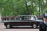 The groom travelled to the ceremony in a Bentley State Limousine with his brother and best man (left) and the bride in a Rolls-Royce Phantom VI 'Silver Jubilee Car' with her father (right)