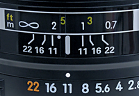 Detail from a lens set to f/11. The point half-way between the 1 m and 2 m marks, the DOF limits at f/11, represents the focus distance of approximately 1.33 m (the reciprocal of the mean of the reciprocals of 1 and 2 being 4/3).