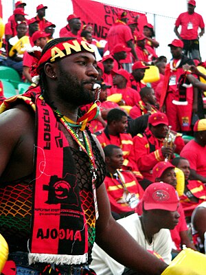 Angolan fans cheering during a match
