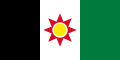 A bandeira de Iraq dende 1959 até 1963, amosa unha identidade unificada coas cores do panarabismo (negro, verde, vermello, branco), as cores kurdas (verde, vermello, branco e amarelo), cun sol amarelo kurdo e o antigo símbolo asirio-babilónico da estrela de Ishtar en vermello por detrás do Sol.