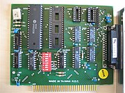 An IBM PC serial card with a 25-pin connector (obsolete 8-bit ISA card)