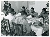 A dinner in Tally Ho, Stem, for African American tenants and neighbors after a day of corn shucking, 1939