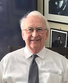 Headshot of Fanning smiling