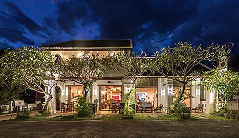 Exterior facade of Residence Bassac at blue hour, town of Champasak, Laos