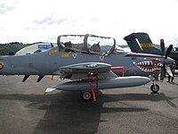 Uma aeronave turboélice Super Tucano, de fabricação brasileira, da Força Aérea Colombiana.