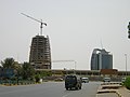 development in Khartoum in 2009, with the PDOC Headquarters at right and the under-construction GNPOC Tower on left