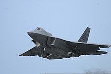 A F-22A Raptor of the 15th Wing taking off from Joint Base Pearl Harbor–Hickam.