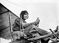 Image 5 Hélène Dutrieu Photo credit: Bain News Service Hélène Dutrieu, shown here in her aeroplane ca. 1911, was the fourth woman in the world (the first from Belgium) to earn a pilot's license and reputedly the first woman to carry passengers and to fly a seaplane. Besides being a pilot, she was a cycling world champion, stunt cyclist, stunt motorcyclist, automobile racer, wartime ambulance driver, and director of a military hospital. More selected pictures