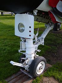 The forward landing gear of a Grumman A-6E Intruder on display at the Pacific Coast Air Museum in Santa Rosa, California by:BrokenSphere
