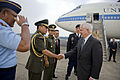 U.S. Secretary of Defense Robert Gates, greeted by Indonesian military members upon arriving at Halim Perdanakusuma International Airport on 22 July 2010