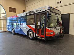 Low Floor (2014) for SamTrans; note larger door glass (square corners) and frameless side windows