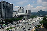 Gwanghwamun, with Sejong Arts Center the Ministry of Foreign Affairs in the center, and Gyeongbokgung and Bukhansan to the right.