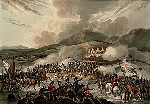 Color print showing soldiers under British flags in the foreground attacking French troops with a backdrop of mountains.