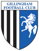 A shield with the words "Gillingham Football Club" in the top portion and the remainder divided into two sections, the left containing black and white vertical stripes and the right a depiction of a white horse rearing up on its hind legs on a blue background