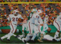 Oil painting of Bills OG Billy Shaw blocking for Bobby Smith against Jets in 1964