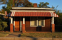 A shotgun-style house in Shed Town.