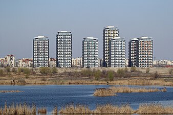 Tower blocks near Văcărești Nature Park, Bucharest, 2006–2010, by Călin Negoescu, Cristina Găleată, Ștefan Cătălin, Cristian Craiveanu, Alexandru Cutelecu[132]