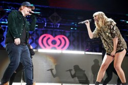 INGLEWOOD, CA - DECEMBER 01:  (EDITORIAL USE ONLY. NO COMMERCIAL USE)  Ed Sheeran (L) and Taylor Swift  perform onstage during 102.7 KIIS FM's Jingle Ball 2017 presented by Capital One at The Forum on December 1, 2017 in Inglewood, California.  (Photo by Christopher Polk/Getty Images for iHeartMedia)