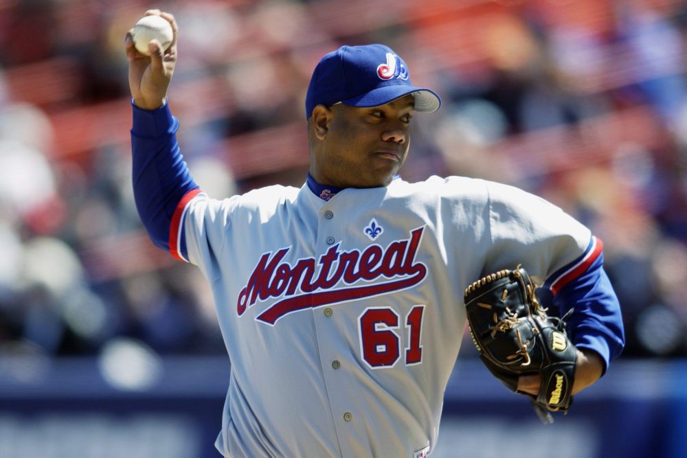 FLUSHING, NY - APRIL 6:  Livan Hernandez #61 of the Monteal Expos throws a pitch during the game against the New York Mets at Shea Stadium on April 6, 2003 in Flushing, New York.  The Expos won 8-5.  (Photo by Ezra Shaw/Getty Images)