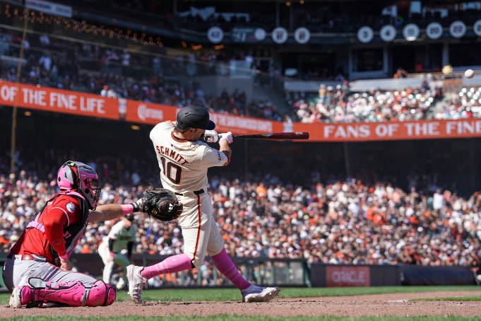 SAN FRANCISCO, CALIFORNIA - MAY 12: Casey Schmitt #10 of the San Francisco Giants hits a game-winning double against the Cincinnati Reds in the bottom of the tenth inning at Oracle Park on May 12, 2024 in San Francisco, California. (Photo by Kavin Mistry/Getty Images)