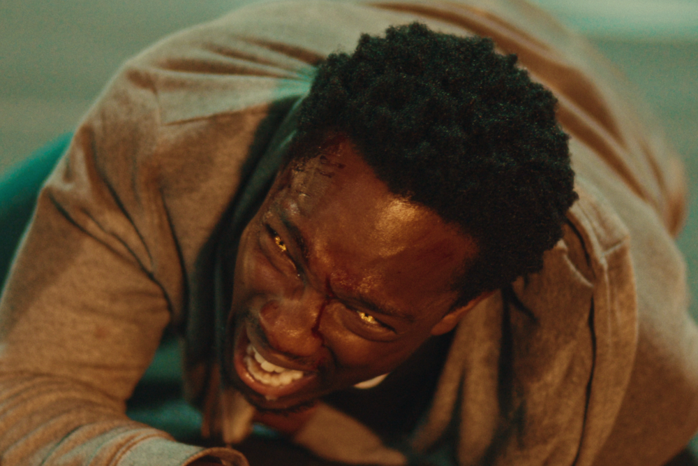 Tosin Cole as Michael in "Supacell"