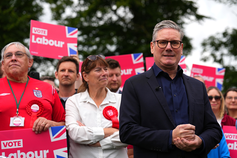 HITCHIN, ENGLAND  - JULY 1: Labour Leader, Sir Keir Starmer, poses for photographers after delivering a stump speech at Hitchin Town Football Club on July 1, 2024 in Hitchin, England. Labour is still riding high in the polls with a 20-point lead over the Conservative Party. (Photo by Carl Court/Getty Images)