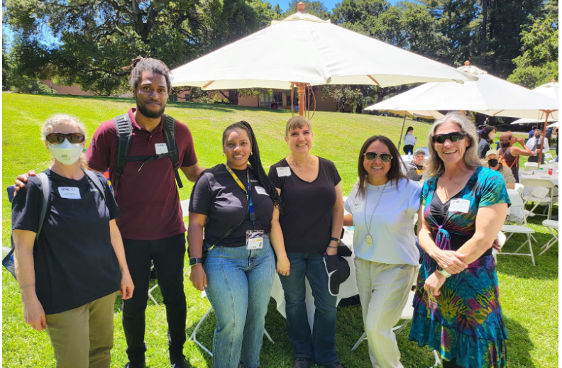 Image of some attendees of the One IT picnic from July 2022