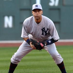 Derek Jeter sports a 1912 uniform, the first year the logo was used.