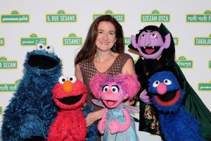 Jim Henson Foundation president Cheryl Henson with Sesame Street cast members