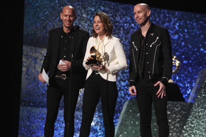 Tim Hanseroth, Brandi Carlile , and Phil Hanseroth, accept award for Best American Roots Song for 'The Joke' 