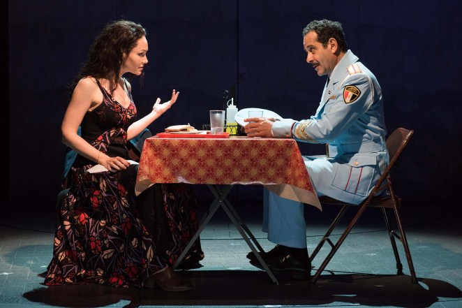 (l-r) Katrina Lenk and Tony Shalhoub in Atlantic Theater Company’s world premiere musical The Band’s Visit, directed by David Cromer, featuring a book by Itamar Moses and original score by David Yazbek. Opening December 8, 2016 at The Linda Gross Theater (336 West 20 Street). Photo: Ahron R. Foster.