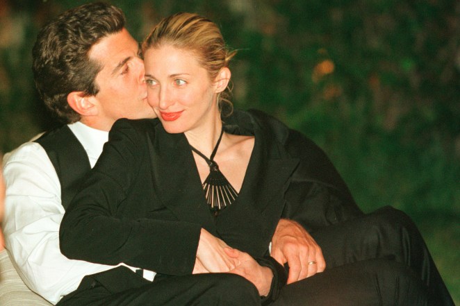 John F. Kennedy, Jr. gives his wife Carolyn a kiss on the cheek during the annual White House Correspondents dinner May 1, 1999, in Washington, D.C.