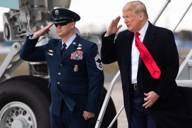 US President Donald Trump disembarks from Air Force One upon arrival at Charlotte Douglas International Airport in Charlotte, North Carolina.