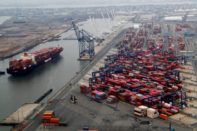  A container ship is seen as hundreds of shipping containers are seen stacked at a pier at the Port of New York and New Jersey in Elizabeth, New Jersey.