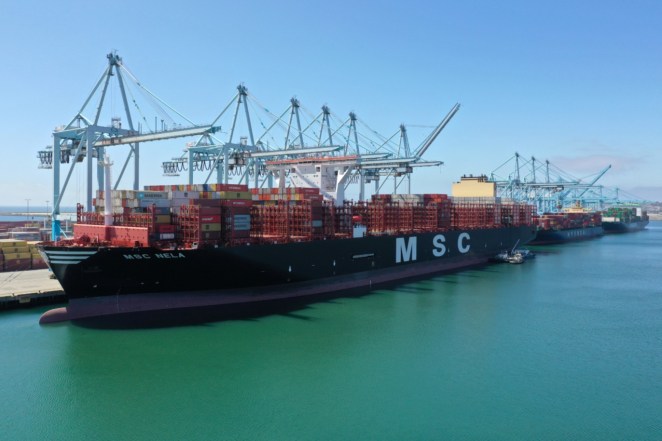 Containers are loaded onto a ship in the Port of Los Angeles, California.