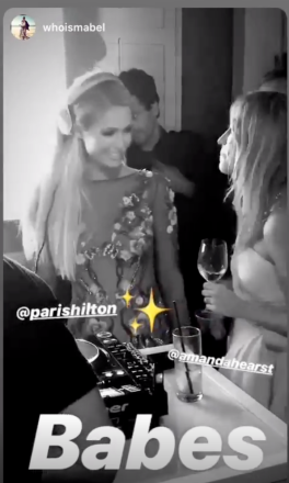 Paris Hilton chats with Amanda Hearst at Hearst's wedding