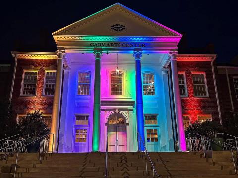 Downtown Cary glowing rainbow colors in honor of Pride Month