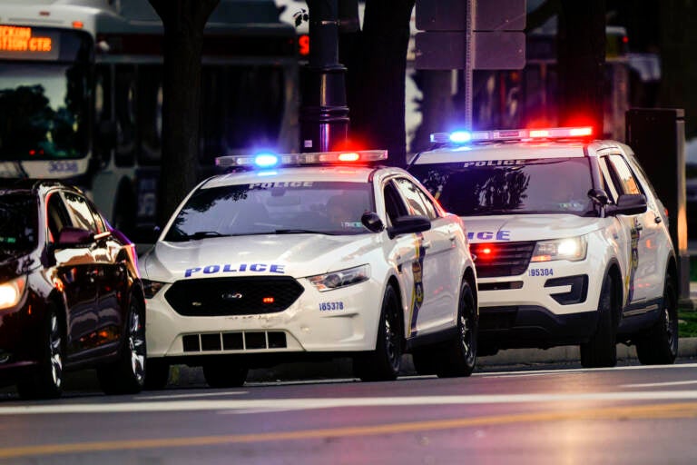 Shown are Philadelphia police vehicles on a traffic stop