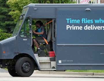 A Amazon truck makes deliveries in Wheeling, Ill., Thursday, May 16, 2024. (AP Photo/Nam Y. Huh)