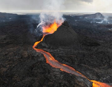 In this photo from June 3, 2024, lava flows from a volcano near Grindavik, Iceland. The area has been a hotbed of volcanic activity since December 2023. (AP Photo/Marco di Marco)