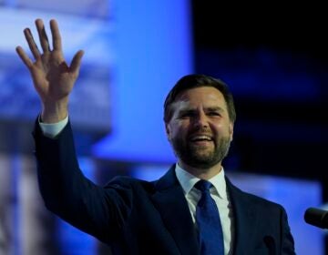 J.D. Vance waves from the stage