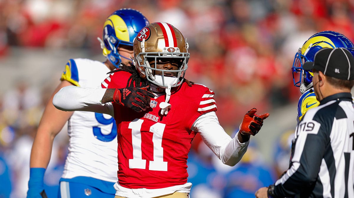 San Francisco 49ers wide receiver Brandon Aiyuk (11) celebrates after a play against the Los Angeles Rams during the first quarter at Levi's Stadium.