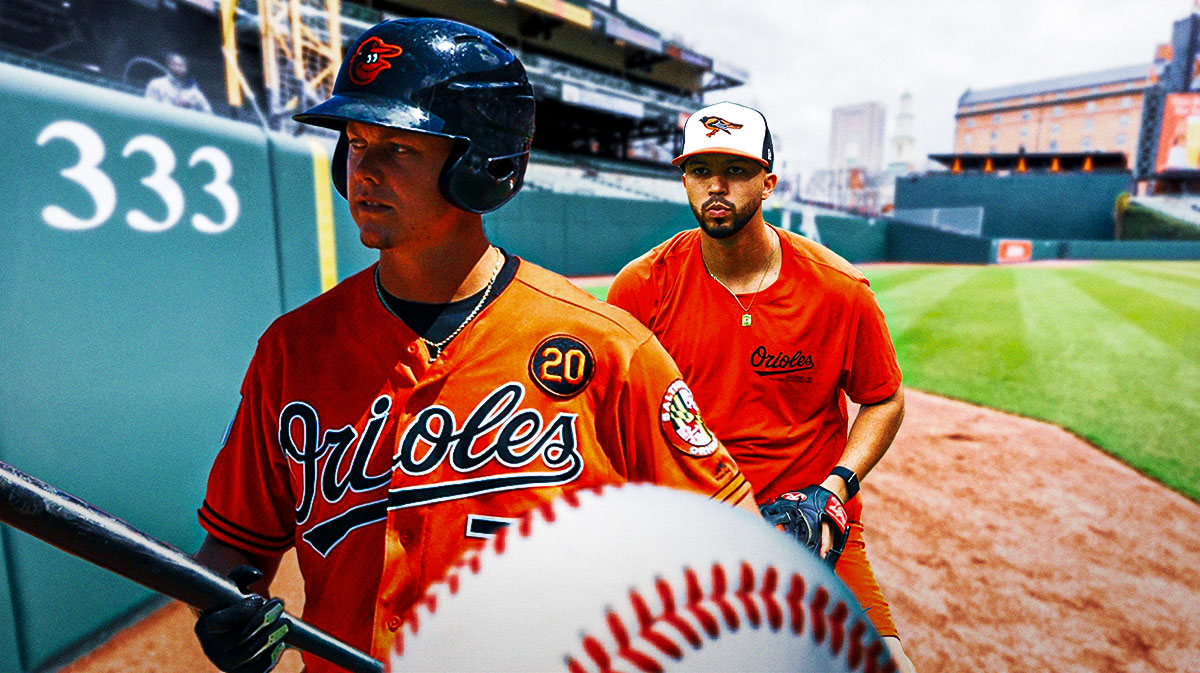 Ryan Mountcastle (Orioles) walking off the field, Livan Soto (Orioles) in background. Location: Camden Yards